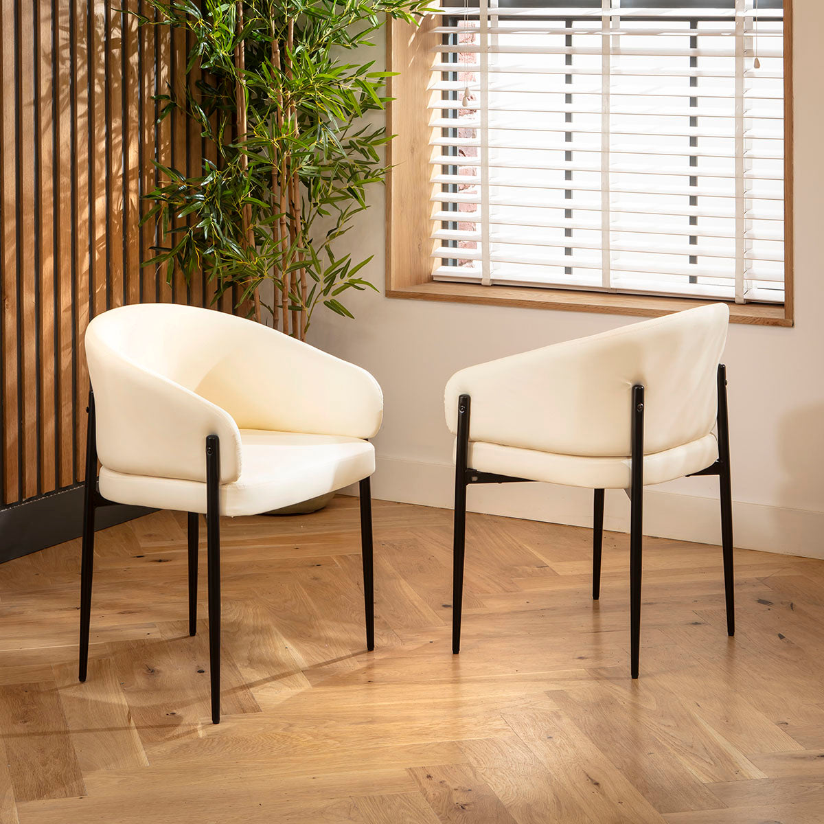 Loki Faux Leather Carver Dining Chair Cream dining chair Such Comfort